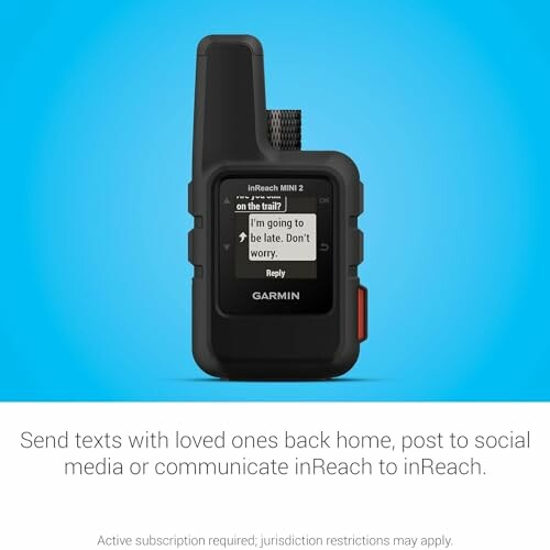 Garmin inReach Mini 2 satellite communicator with displayed text message.