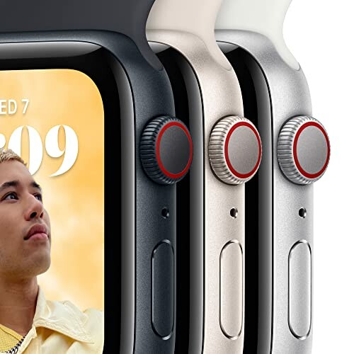 Close-up of smartwatch displays with digital crown and side buttons.