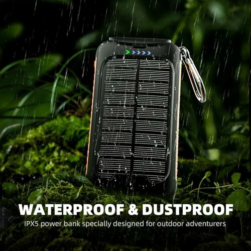 Waterproof and dustproof solar power bank on mossy surface in rain.